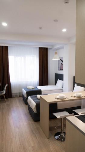 Postel nebo postele na pokoji v ubytování Hide Apart Hotel