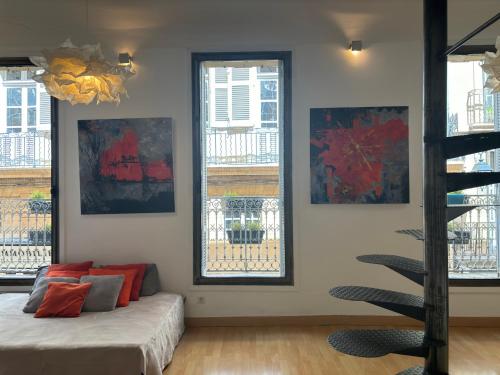 Postel nebo postele na pokoji v ubytování Le Loft du Matheron