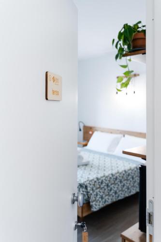 Dimora EFFE - Eco B&Bにあるベッド
