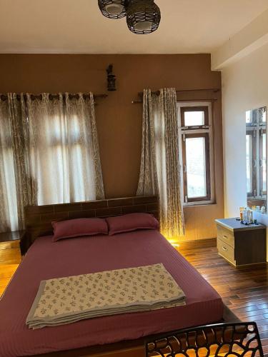 Postel nebo postele na pokoji v ubytování Peakman Residence