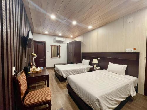 Postel nebo postele na pokoji v ubytování Maison Duyên