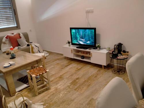 TV a/nebo společenská místnost v ubytování heaven beach sidi rehal