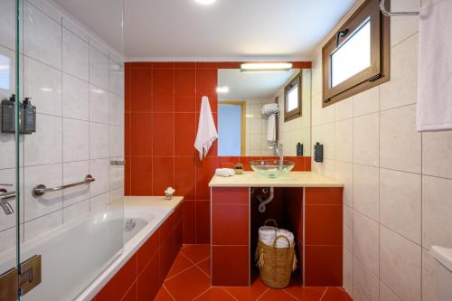 Koupelna v ubytování Elisso Hotel