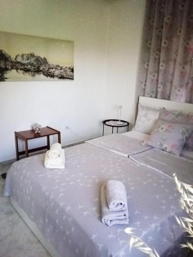 Ένα ή περισσότερα κρεβάτια σε δωμάτιο στο Villa Leah