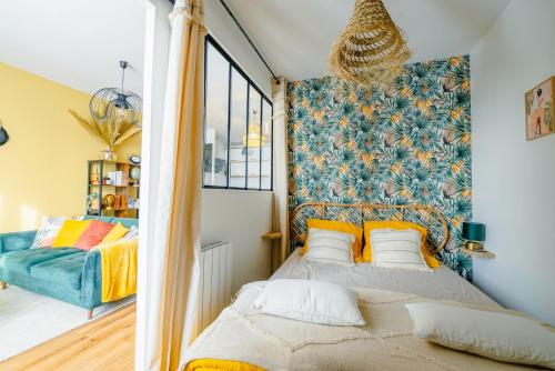 Postel nebo postele na pokoji v ubytování Tiaré