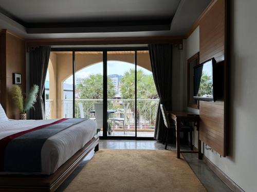 Postel nebo postele na pokoji v ubytování Grand Orlov Apart Hotel