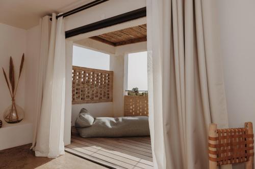 Postel nebo postele na pokoji v ubytování VILLA FLAKA Boutique Hôtel Confidentiel et Convivial