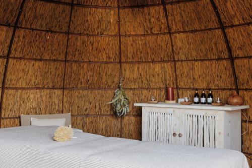 Postel nebo postele na pokoji v ubytování VILLA FLAKA Boutique Hôtel Confidentiel et Convivial