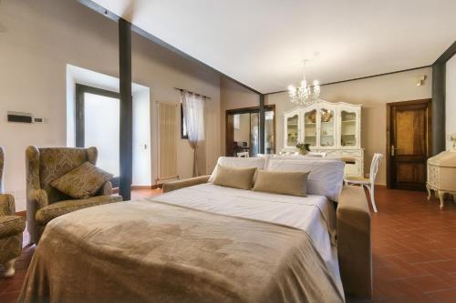 Postel nebo postele na pokoji v ubytování Castellare Loft appartamento in collina a Firenze