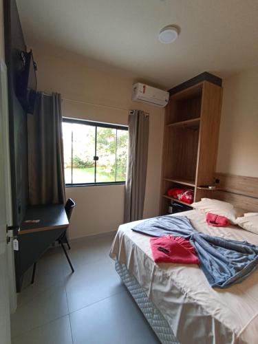 Postel nebo postele na pokoji v ubytování Hotel Mafra