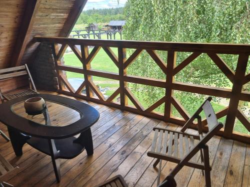 Balkón alebo terasa v ubytovaní Bębnikąt Osada Leśna Puszcza Notecka