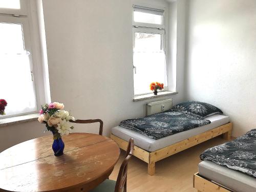 Postel nebo postele na pokoji v ubytování Meeraner Parkresidenz