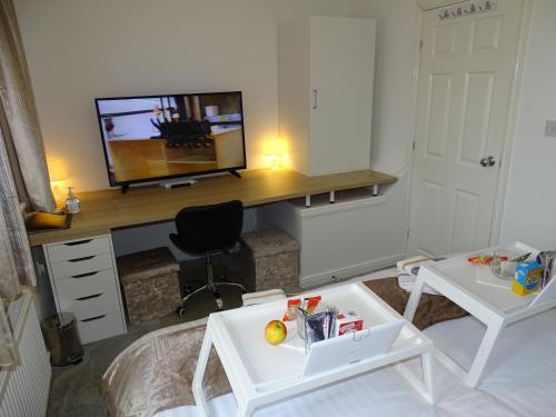 Μια τηλεόραση ή/και κέντρο ψυχαγωγίας στο Ramskir Apartment