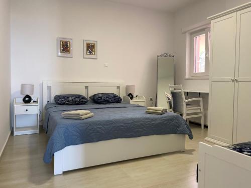 En eller flere senge i et værelse på D&M APARTMENTS