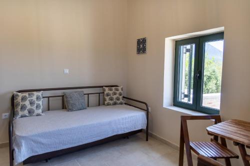Mani Tsopakas Residencesにあるベッド
