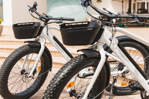two bikes are parked next to each other at Ibersol Almuñecar Beach & Spa Hotel in Almuñécar