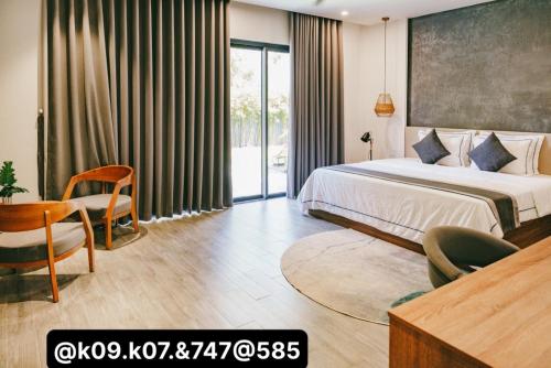 Gallery image of 04-Biệt thự cao cấp Hồ Tràm-3BR SUPER KINGS, Hồ bơi to,BBQ, cầu ra ngắm biển in Xuyên Mộc