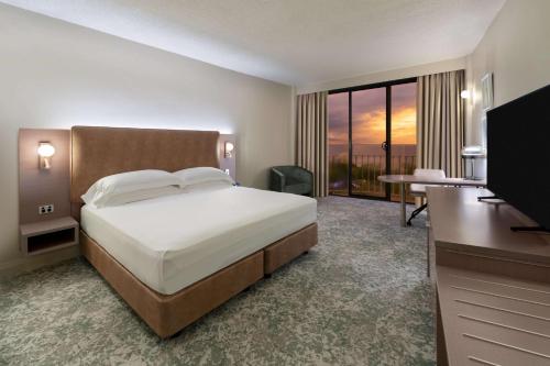 Télévision ou salle de divertissement dans l'établissement Hilton Garden Inn Darwin