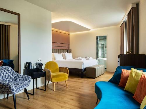 Postel nebo postele na pokoji v ubytování Mercure Paris Nanterre