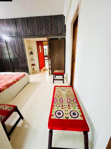 Ένα ή περισσότερα κρεβάτια σε δωμάτιο στο Kinara 2Bhk Candolim