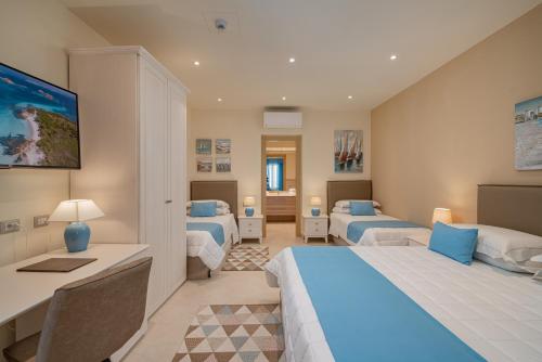 Un ou plusieurs lits dans un hébergement de l'établissement Hotel Panorama