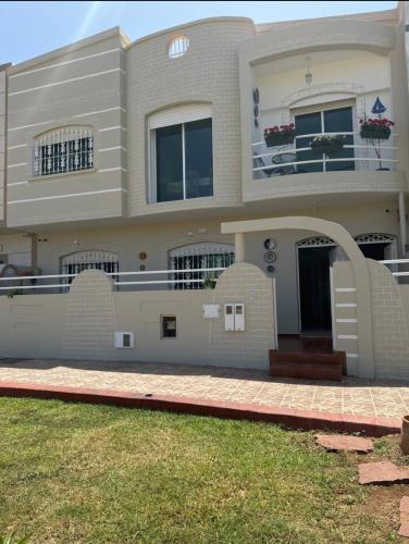 a house with a front view of it at Albahria in El Jadida