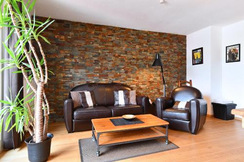 Istumisnurk majutusasutuses Appartement Côté Vignes avec Terrasse et Parking