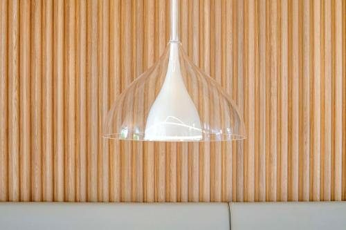 a chandelier hanging from the ceiling in a room at Prize by Radisson, Münster City in Münster