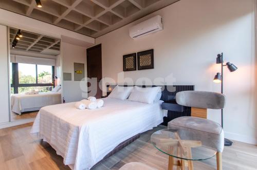 Postel nebo postele na pokoji v ubytování Loft Near Shopping Mcal Lopez And Villa Morra
