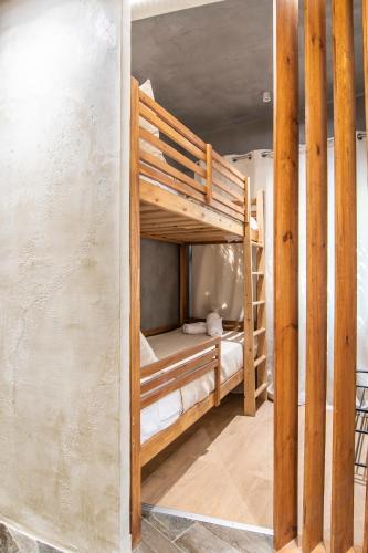a bedroom with bunk beds in a room at Villa Steana in Makri