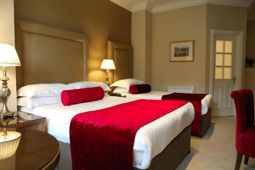 Katil atau katil-katil dalam bilik di International Hotel Killarney