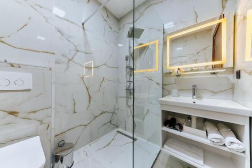 a bathroom with a shower and a sink at M&N Holiday Resort in Ulcinj