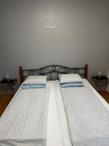 Postel nebo postele na pokoji v ubytování MCA Apartments