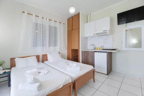Η κουζίνα ή μικρή κουζίνα στο S7 apartment