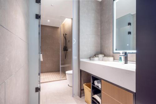 Ένα μπάνιο στο Atour Hotel Wuhan Optics Valley Plaza Nationalities University