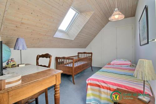 Una cama o camas en una habitación de L'escale oceane