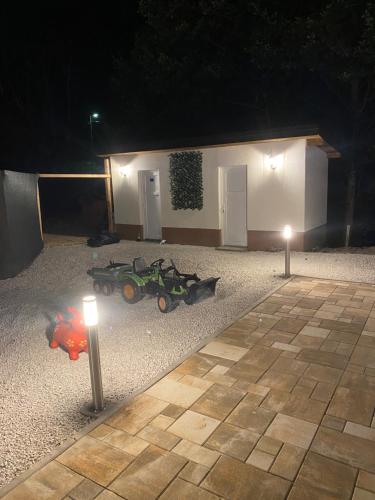 a yard with two lights in front of a building at Sarajevo Deluxe penthouse and pool in Sarajevo