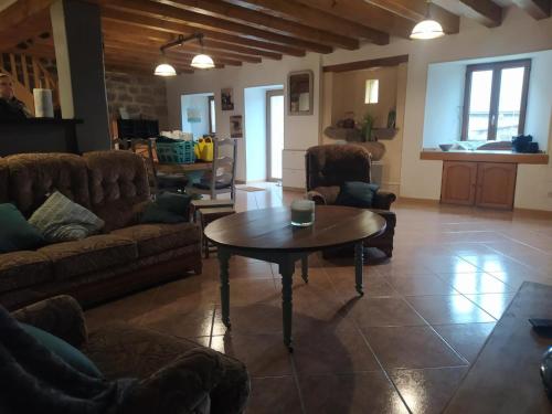 Ruang duduk di Gîte Gîte du Cantou 6/7 personnes