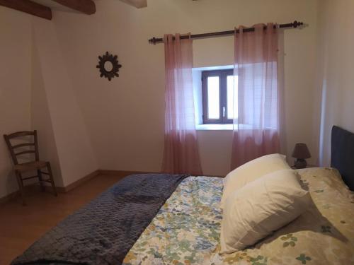 Katil atau katil-katil dalam bilik di Gîte Gîte du Cantou 6/7 personnes