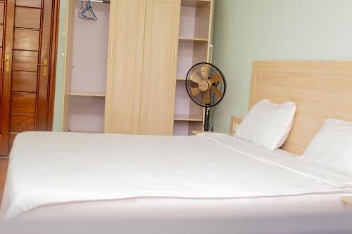 Ένα ή περισσότερα κρεβάτια σε δωμάτιο στο SANTA COLUMBUS APPARTEMENT