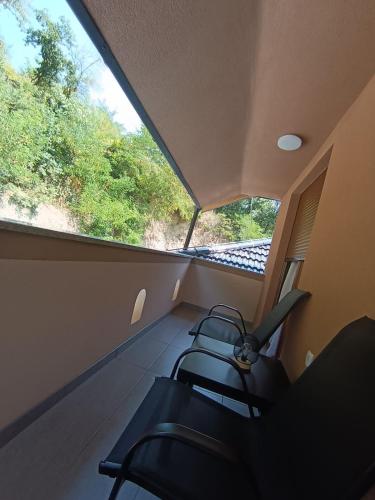 a view from the inside of a train looking out the window at Apartmani Smiljković90 in Aleksandrovac