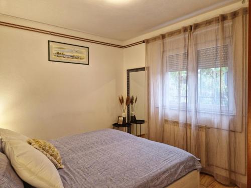 Posteľ alebo postele v izbe v ubytovaní Apartman PP 13