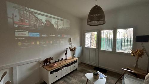 047- T2 Proche MBS, 4pers, Wifi, Parking, jardinet