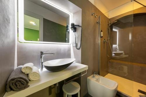 Koupelna v ubytování Hotel Fiume