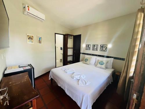 Postel nebo postele na pokoji v ubytování Casa Tua Pipa