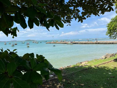 a view of a harbor with boats in the water at Star Eyes Hostel in Weligama