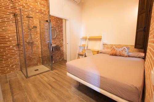 Postel nebo postele na pokoji v ubytování Barcelona Classic Catedral Apartments