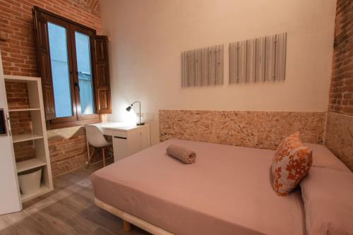 Postel nebo postele na pokoji v ubytování Barcelona Classic Catedral Apartments