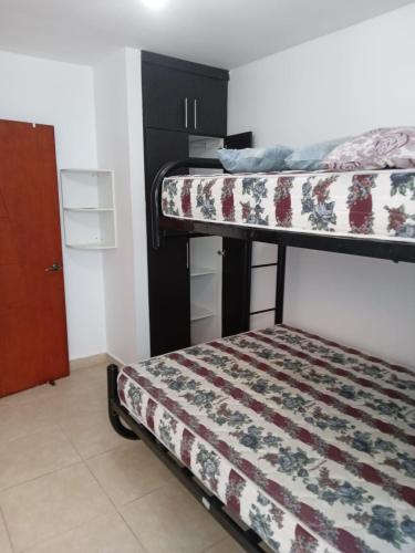 Postel nebo postele na pokoji v ubytování Alquiler casa en Tonsupa