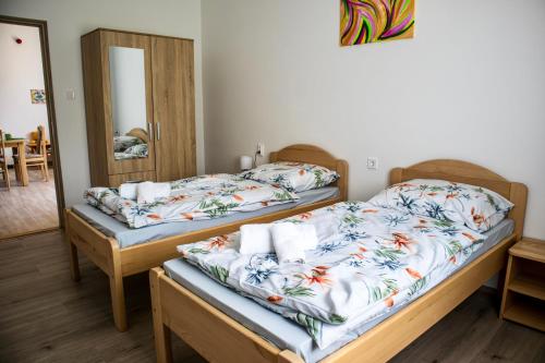 Ízisz Apartmanにあるベッド